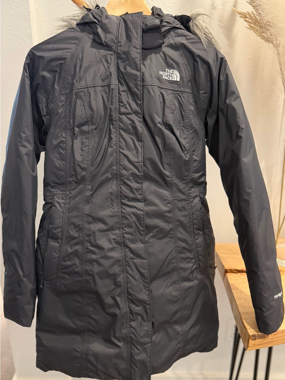 Women’s The North Face HyVent insulated parka with faux-fur hood trim.